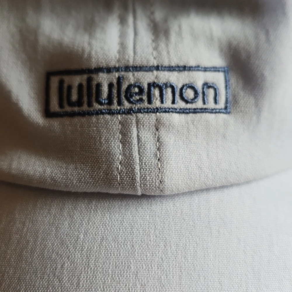 lululemon Baby Blue baseball cap with Silver Metal logo On Side - Picture 2 of 11